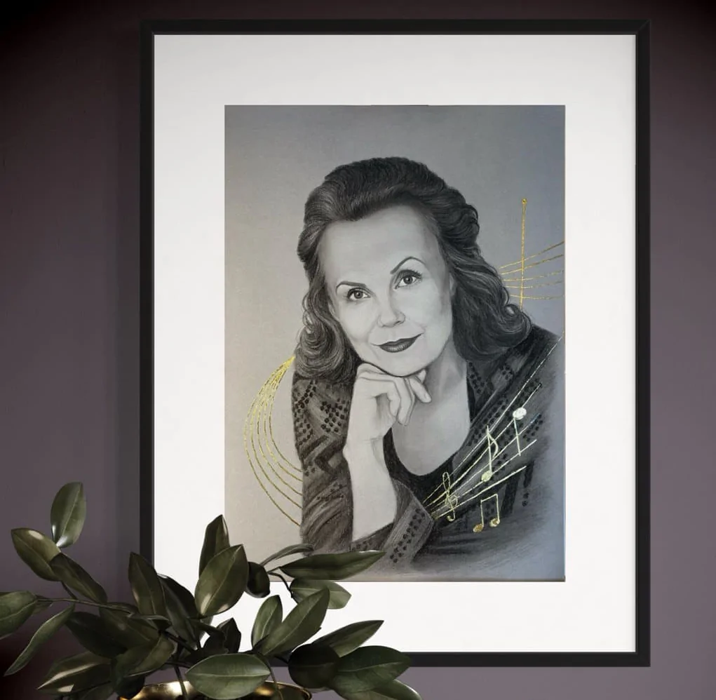 A soft pastel portrait created on toned grey paper, enriched with delicate gold foil accents placed at the waist. The contrast between the muted background, subtle pastel tones, and golden details adds elegance, depth, and a refined artistic touch.